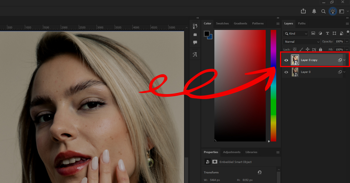 Photoshop interface showing a duplicated image layer highlighted with a red arrow during photo retouching